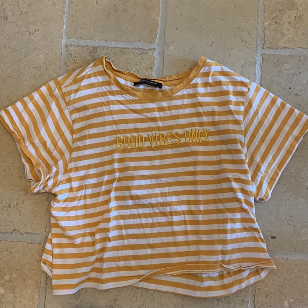 A cute crop top in the brand attitude not included
